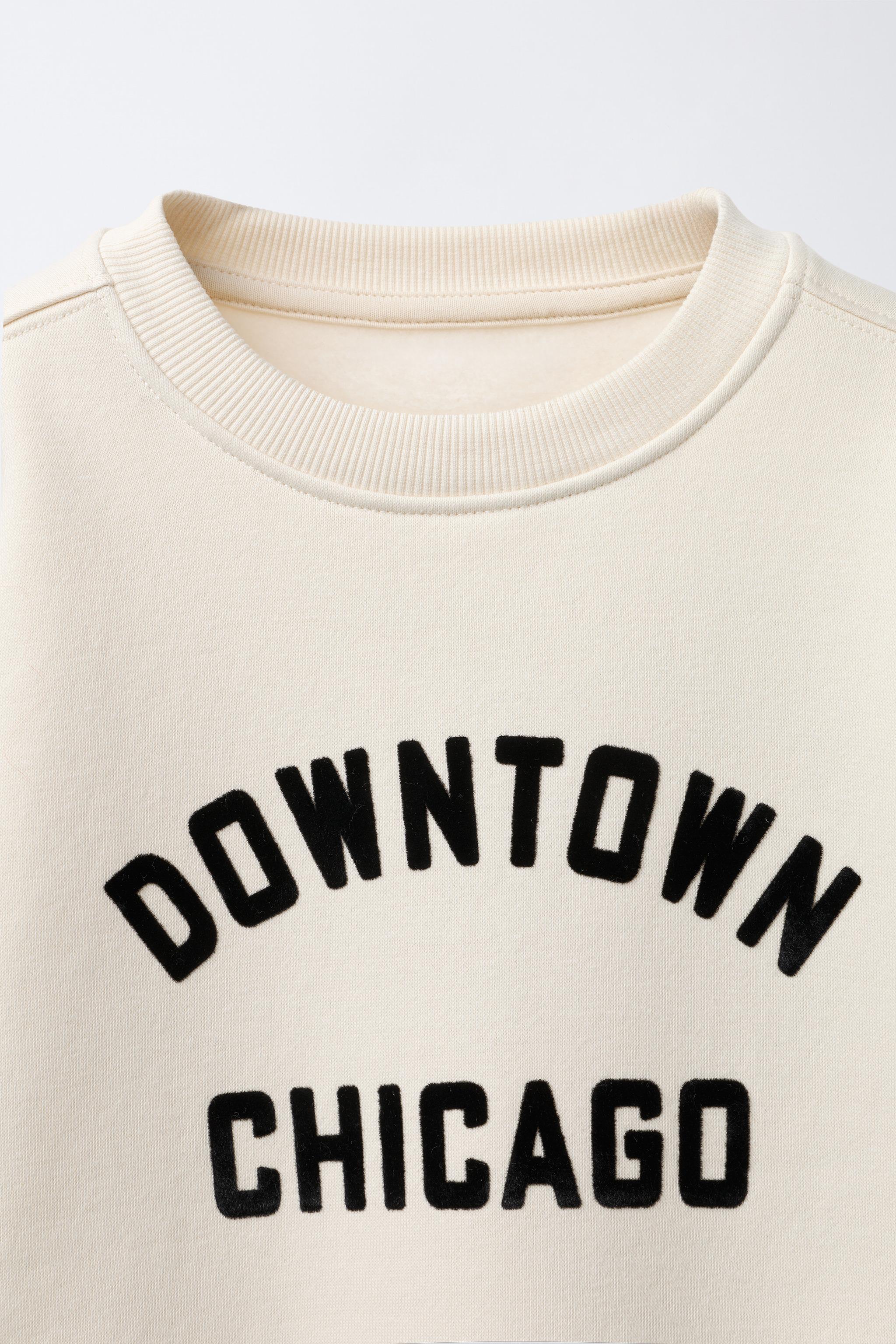 FLOCKED TEXT SWEATSHIRT